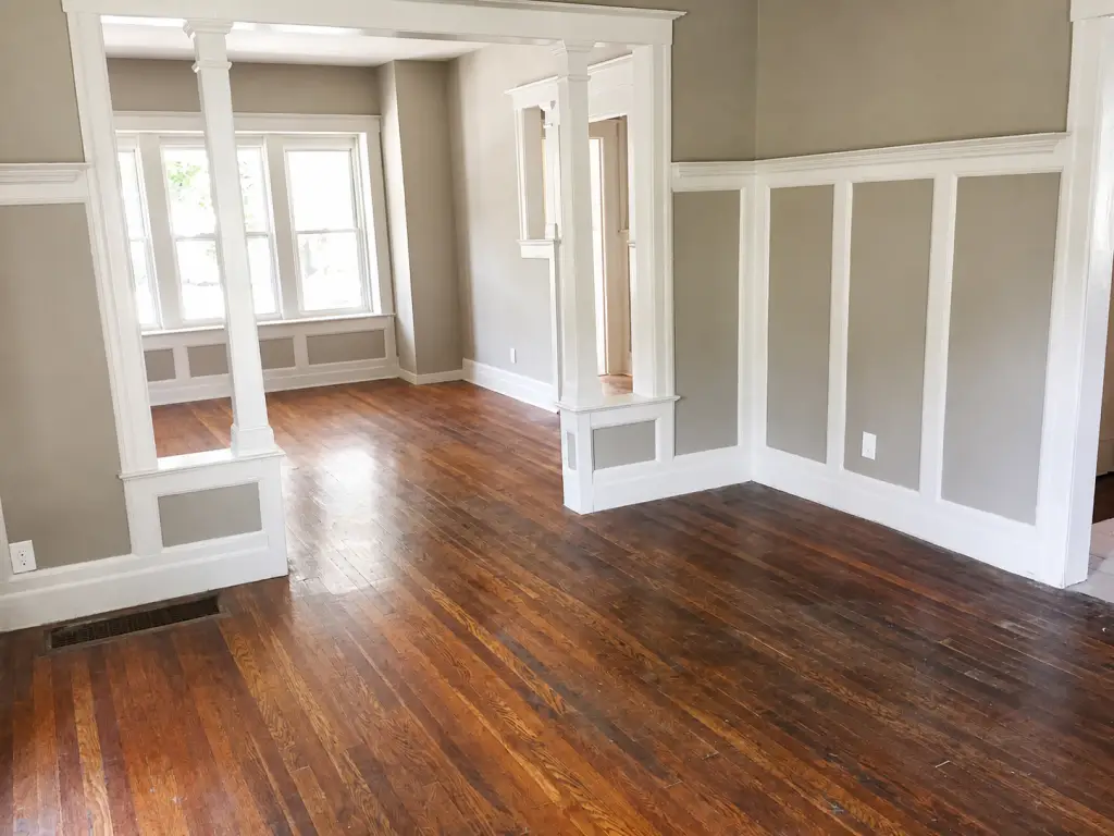 Historic Colonial living room with original woodwork at Burlingame Street in Virginia Park, Detroit