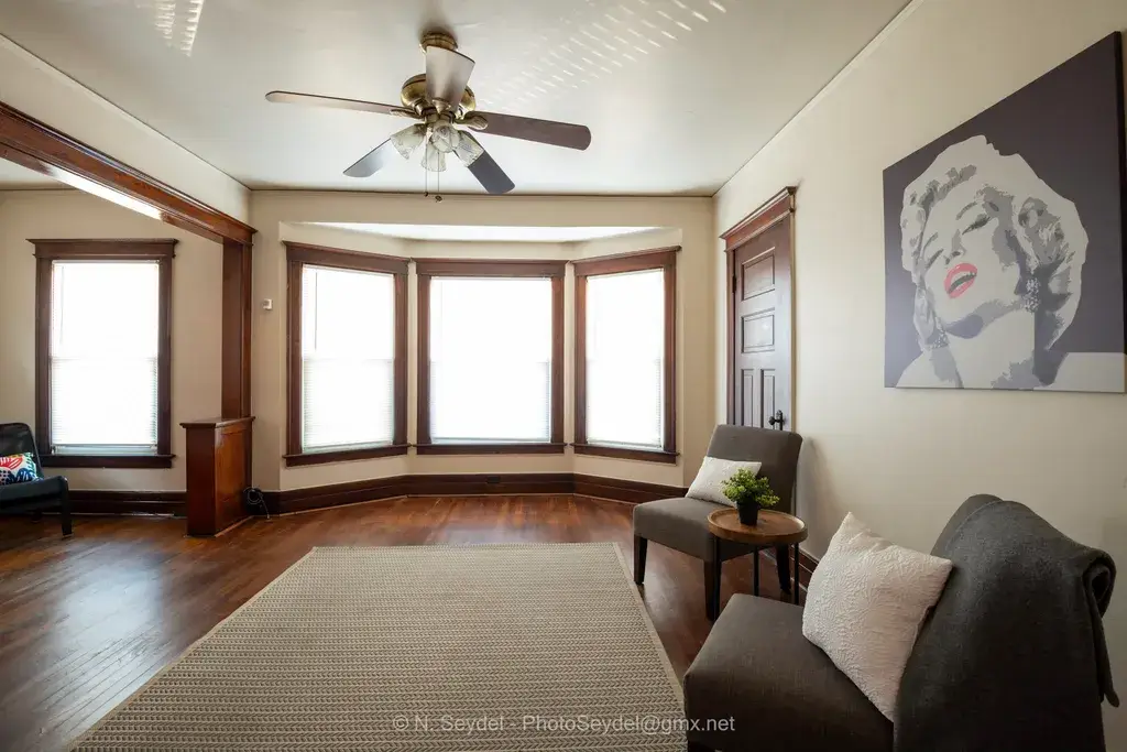 1135 West Euclid Street living room with bay windows and hardwood floors